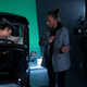 David Corenswet (left) and Janet Mock on the set of Hollywood (2020).